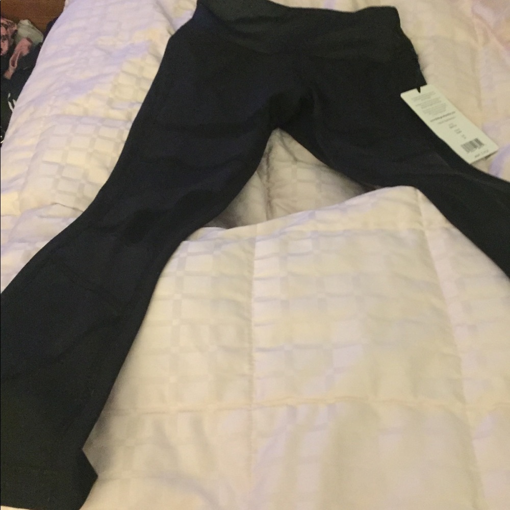 Yoga pants size XS but fits like a small
